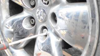 How To Remove Chrome Caps From Lug Nuts [upl. by Yelyak]